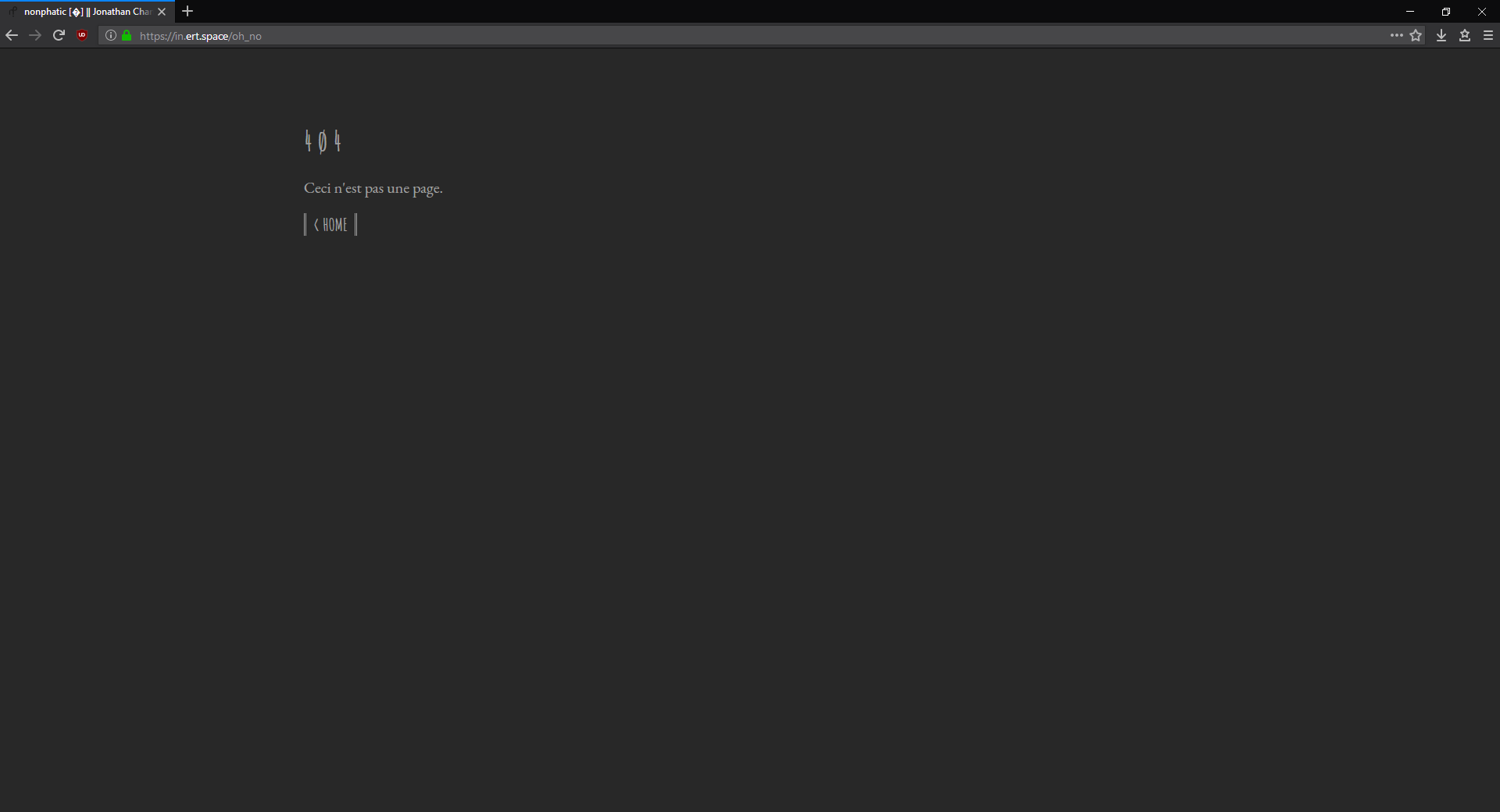 Custom 404 page for in.ert.space, complete with cool fonts, a nice shade of black, and U+FFFD